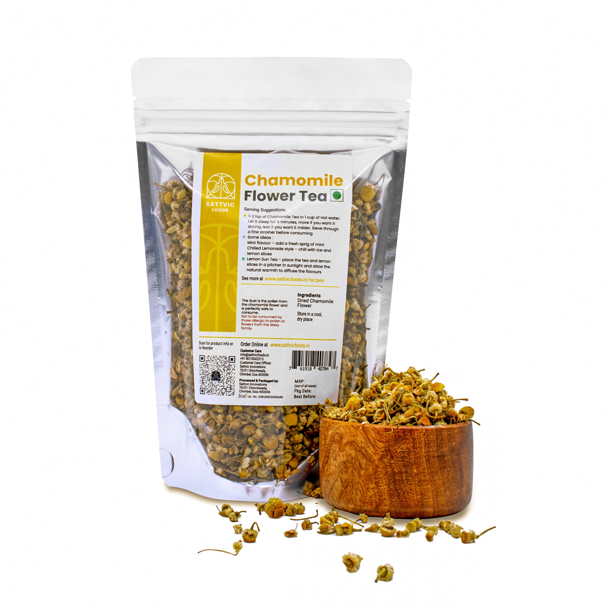 Sattvic foods chamomile flowers in a stand up pouch with a bowl of dried chamomile flowers beside it