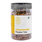 A jar of sattvic foods dried chamomile flowers