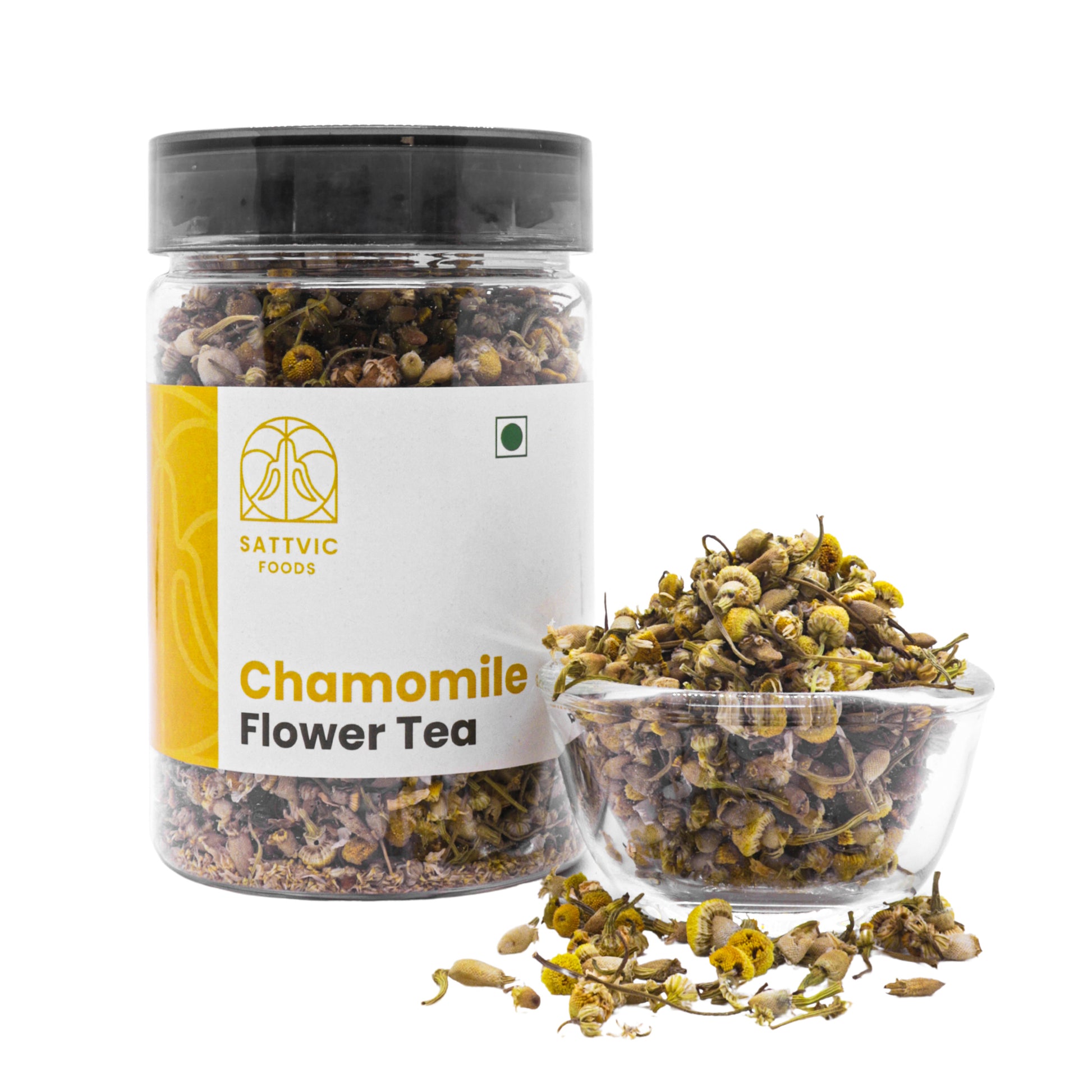 Sattvic foods chamomile flowers in a jar with a bowl of dried chamomile flowers beside it