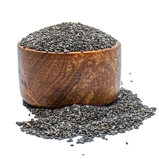 A wooden bowl with chia seeds