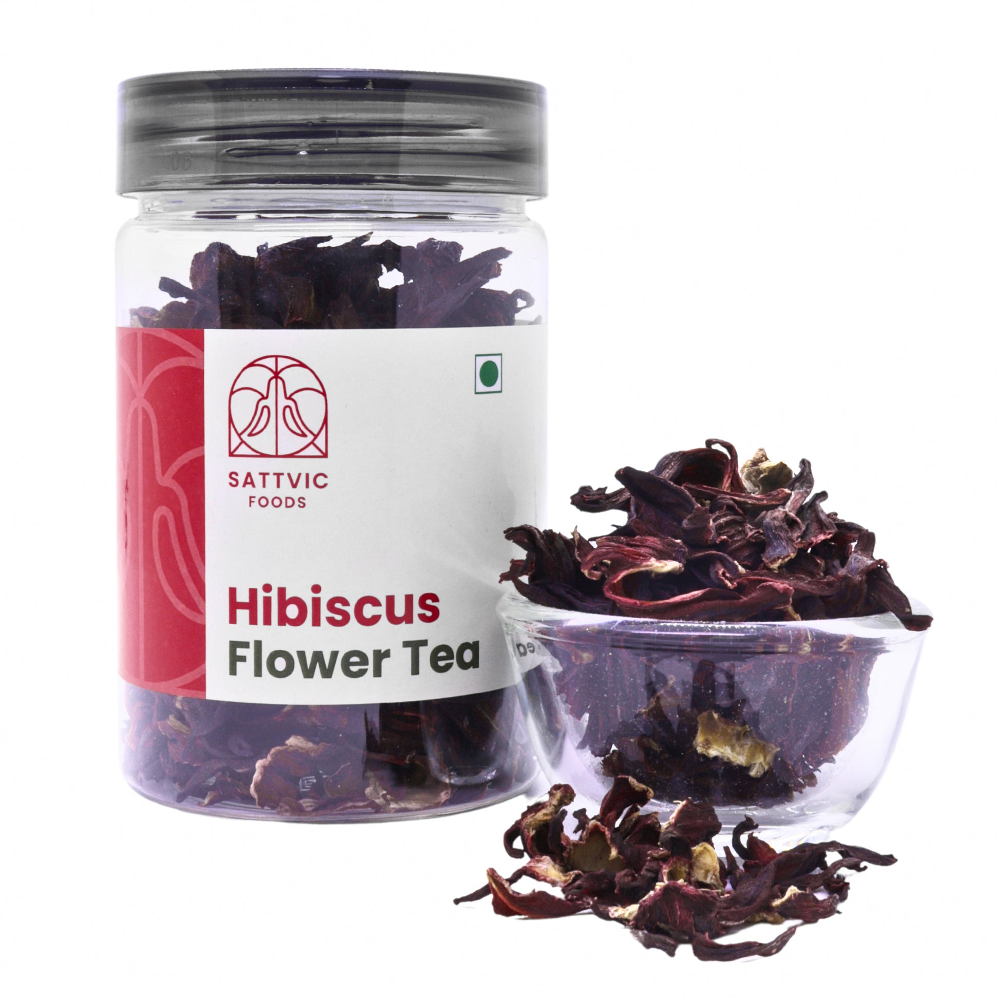 Sattvic Foods jar of loose dried hibiscus flower with a bowl beside it.