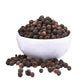 Black peppercorns in a bowl