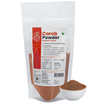 Carob powder package with a spoonful of powder on a white background