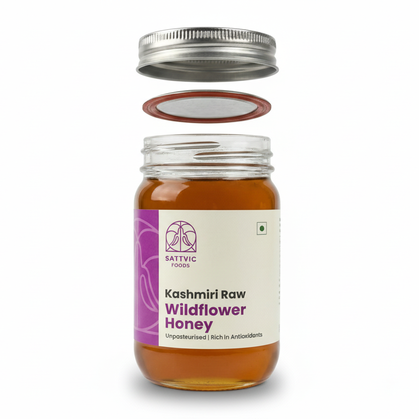 Jar of Kashmiri Raw Wildflower Honey with a Sattvic Foods label on a white background