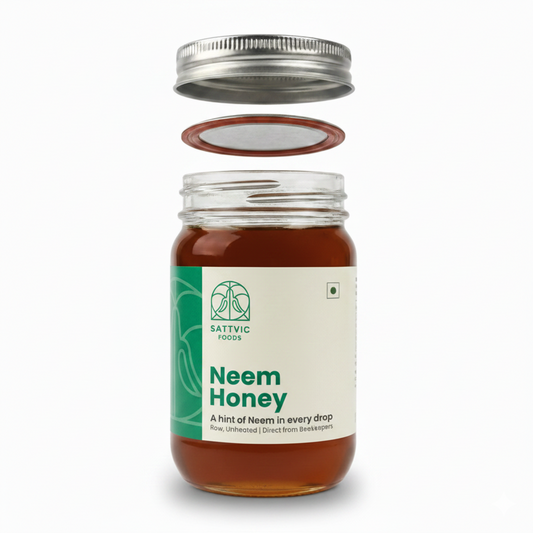 Jar of Neem Honey with a green label on a white background